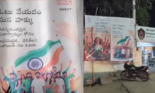 ఎన్నికల సంఘం ఫ్లెక్సీలో జాతీయ జెండాకు అవమానం!