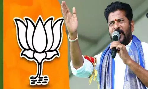 సీటు కాపాడుకునేందుకే సీఎం ఆ పని చేస్తున్నాడు.. రేవంత్ రెడ్డిపై బీజేపీ ఫైర్