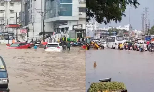 చెరువుగా మారిన విజయవాడ హైవే! నగరంలో భారీ వర్షం