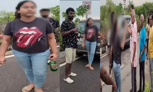 పొద్దున్నే తాగుతూ వాకర్స్‌తో గొడవ పడిన జంట ( వీడియో)