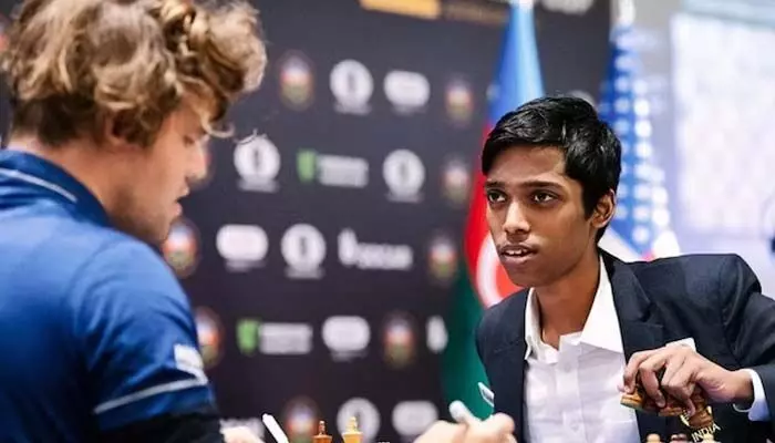 Chess: వరల్డ్ నం.1 కార్ల్సెన్కు షాకిచ్చిన ప్రజ్ఞానంద Chess: వరల్డ్ నం.1 కార్ల్సెన్కు షాకిచ్చిన ప్రజ్ఞానంద