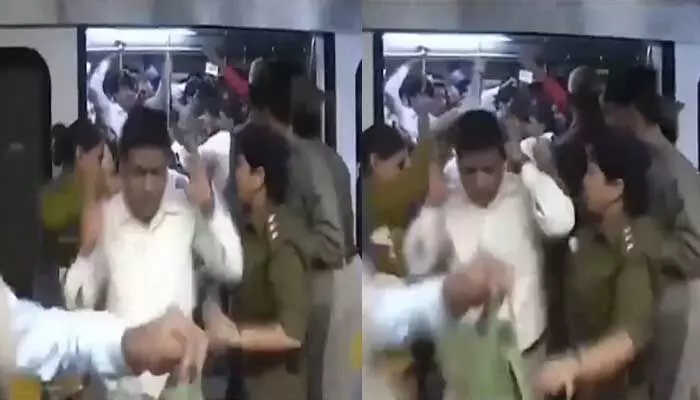 మెట్రో లేడీస్ కోచ్ లో దర్జాగా పురుషులు..చెంపలు చెల్లుమనిపించిన పోలీసులు మెట్రో లేడీస్ కోచ్ లో దర్జాగా పురుషులు..చెంపలు చెల్లుమనిపించిన పోలీసులు