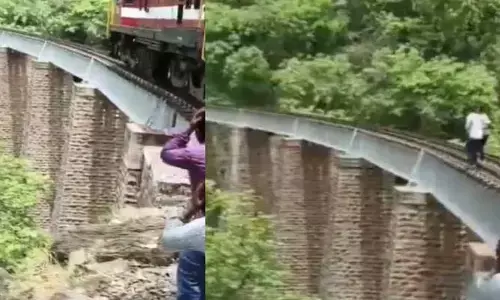 రైల్వే ట్రాక్‌పై ఫొటో షూట్.. సడెన్‌గా ట్రైన్ రావడంతో 90 అడుగుల లోతులోకి దూకడంతో..4