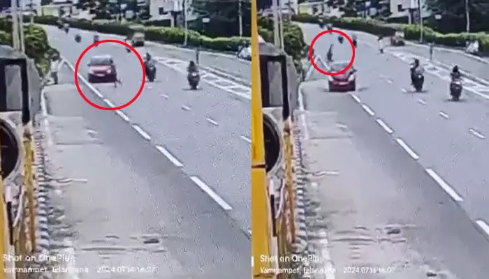 ఫోన్ మాట్లాడుతూ రోడ్డు దాటుతుండగా ప్రమాదం!.. గాల్లో ఎగిరిపడి యువకుడు ఫోన్ మాట్లాడుతూ రోడ్డు దాటుతుండగా ప్రమాదం!.. గాల్లో ఎగిరిపడి యువకుడు
