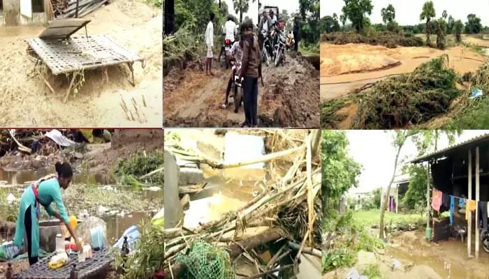 Heavy Rains: ఏలూరు జిల్లాలో వరద విధ్వంసం... భారీగా నష్టం Heavy Rains: ఏలూరు జిల్లాలో వరద విధ్వంసం... భారీగా నష్టం