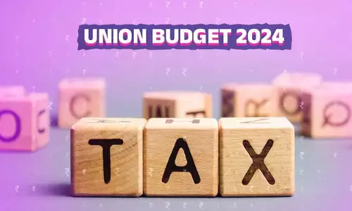 Tax: పన్ను స్లాబ్‌‌లో మార్పుల వల్ల మధ్యతరగతి వారికి రూ.17,500 ఆదా: CBDT చైర్మన్