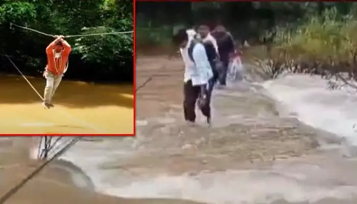 వాగు దాటి.. అతి కష్టం మీద పెన్షన్ పంపిణీ వాగు దాటి.. అతి కష్టం మీద పెన్షన్ పంపిణీ