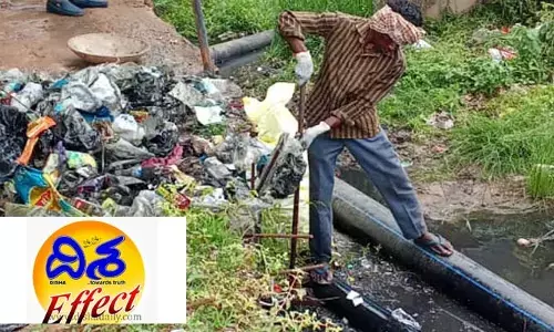 దిశ ఎఫెక్ట్​...భగీరథ పైప్​ల వద్ద చెత్త తొలగింపు