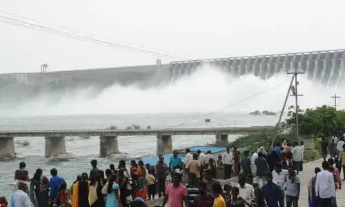 సాగర్ గేట్లు 26 ఓపెన్.. జన సాగరం కృష్ణాతీరం..