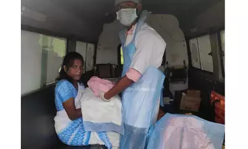 అంబులెన్స్ లో మహిళ ప్రసవం