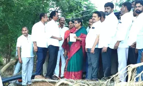 చెరువుకు గండి పడటం బాధాకరం