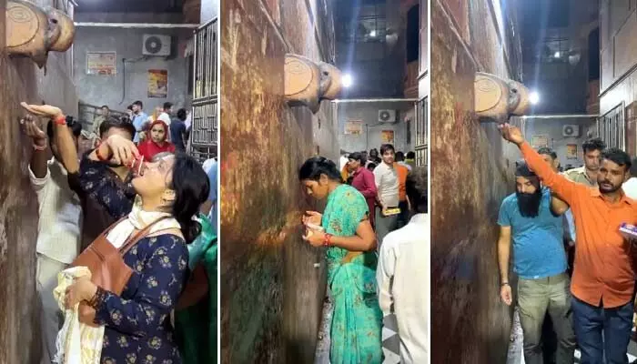 Devotees drink AC Water : దేవాలయంలో ఏసీ నుంచి కారుతున్న నీళ్లు.. తాగేందుకు ఎగబడుతున్న భక్తులు Devotees drink AC Water : దేవాలయంలో ఏసీ నుంచి కారుతున్న నీళ్లు.. తాగేందుకు ఎగబడుతున్న భక్తులు