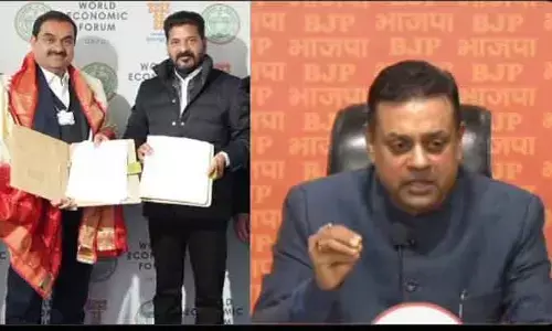 BJP : అదానీ అవినీతిపరుడైతే రేవంత్ రెడ్డి 100 కోట్ల విరాళం ఎందుకు తీసుకున్నారు? : బీజేపీ