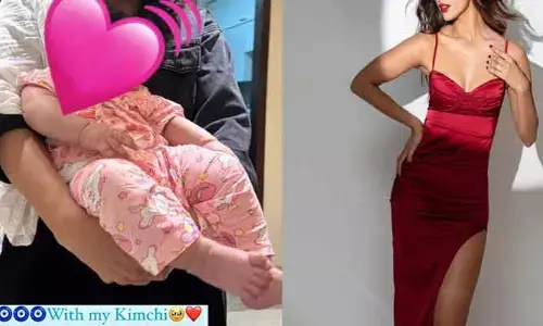 పెళ్లి కాకుండానే బిడ్డతో దర్శనమిచ్చి షాకిచ్చిన నేషనల్ క్రష్.. నా కిమ్చి అంటూ పోస్ట్