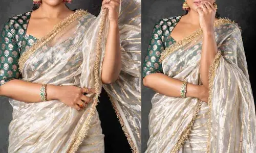 ఉల్లి పొరలాంటి చీరలో దర్శనమిచ్చిన వెంకీ హీరోయిన్.. తలైవీ అంటూ నెటిజన్ల కామెంట్స్