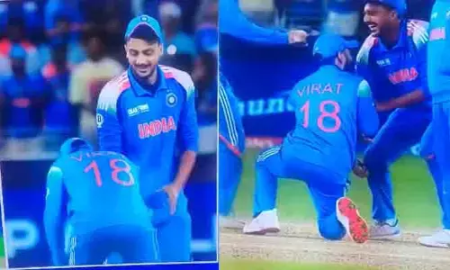 అక్షర్ పటేల్ కాళ్లను పట్టుకోబోయిన విరాట్ కోహ్లీ.. వీడియో వైరల్