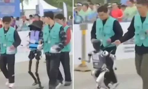 Humanoid Robot: మారథాన్‌లో మనుషులతో పోటీగా పరుగులు పెట్టిన రోబోలు