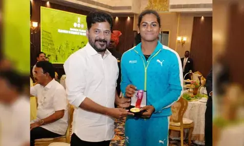 ఏషియన్​గోల్డ్ మెడల్​ నందిని ఆగసరకు సీఎం రేవంత్ రెడ్డి అభినందన