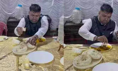 Food Lover: వర్షంలో విందు..! భోజన ప్రియుడి వీడియో నెట్టింట్లో వైరల్‌