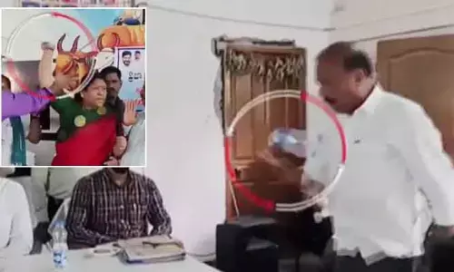 రేషన్ కార్డుల పంపిణీలో రగడ.. కాంగ్రెస్ నేతపై బాటిల్ విసిరిన ఎమ్మెల్యే కోవ లక్ష్మి