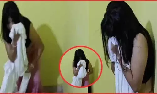 ప్రియుడితో పట్టుబడ్డ ప్రభుత్వాధికారి భార్య.. ఓయోలో బట్టలు లేని స్థితిలో.. ఛీ..ఛీ.. (VIDEO)
