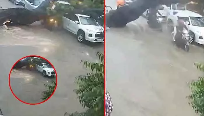 Viral : వర్ష బీభత్సం.. ఒక్కసారిగా విరిగి మీదపడ్డ వేపచెట్టు.. తండ్రీ కూతుళ్ల పరిస్థితి ఘోరం! Viral : వర్ష బీభత్సం.. ఒక్కసారిగా విరిగి మీదపడ్డ వేపచెట్టు.. తండ్రీ కూతుళ్ల పరిస్థితి ఘోరం!