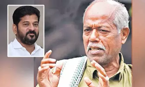 వర్షం పడకుండా రేవంత్ రెడ్డి ఆపిండు: కవి అందెశ్రీ