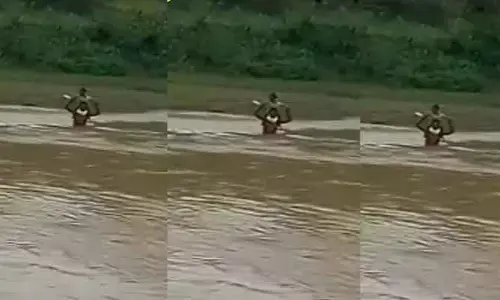 వాగులో తండ్రి బాహుబలి సాహసం