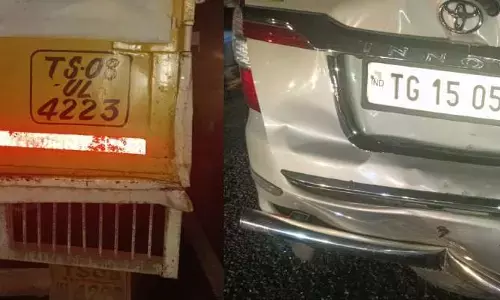 స్కూటీని ఢీకొన్న లారీ...సడన్ బ్రేక్ వేయడంతో