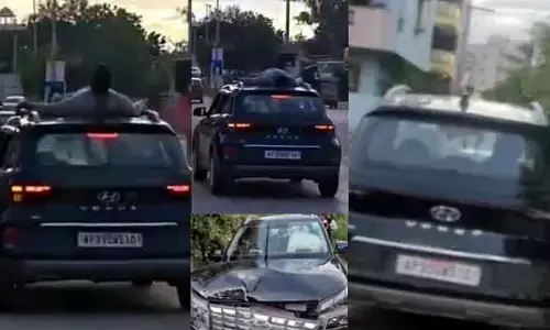 కారుపైకెక్కి.. మందుబాబు హల్ చల్