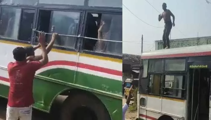 బస్సు పై యువకుడు హల్ చల్ బస్సు పై యువకుడు హల్ చల్