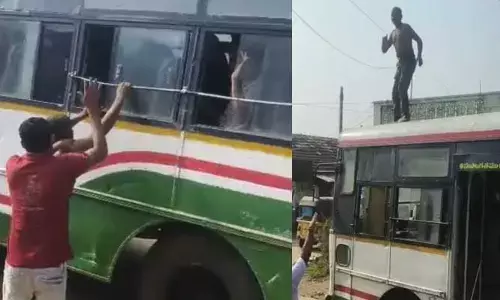 బ‌స్సు పై యువ‌కుడు హ‌ల్ చ‌ల్