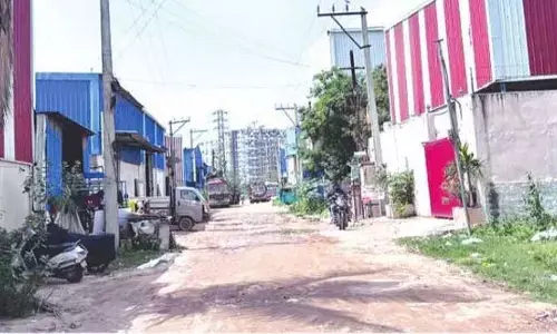 ‘ఇందిరాగాంధీ’ సొసైటీ‌లో అక్రమ షెడ్ల నిర్మాణం