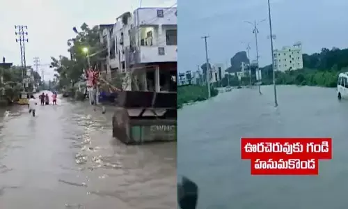 హన్మకొండ ఊర చెరువుకు గండి.. నీట మునిగిన కాలనీలు