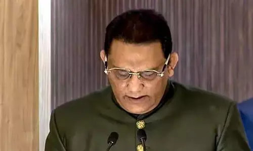 మంత్రిగా ప్రమాణం చేసిన అజారుద్దీన్.. కేటాయించే శాఖలివే?