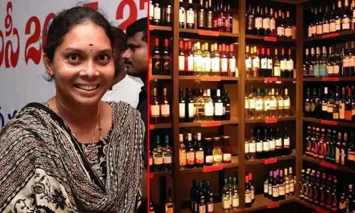 వైన్ షాపు వచ్చె.. మహిళా టీచర్ ఉద్యోగం పాయె!