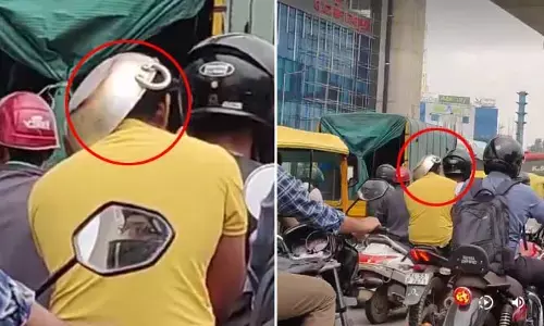 ఎవర్రా నువ్వు ఇలా ఉన్నావ్? బెంగళూరు ట్రాఫిక్‌లో వినూత్న దృశ్యం.. హెల్మెట్‌ బదులు కడాయి!
