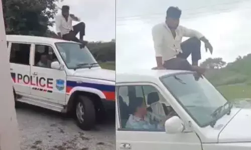 పోలీసు వాహనంపై రీల్స్..అస‌లు విష‌యం ఇదే!