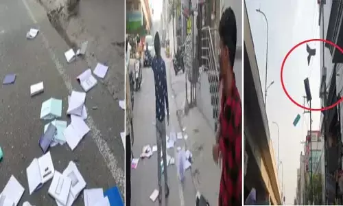 హైదరాబాద్⁪లో మాస్ కాపీయింగ్.. స్క్వాడ్ రాకతో రోడ్డుపైకి పుస్తకాలు విసిరివేత