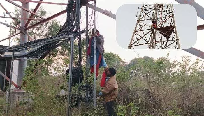 సెల్ టవర్ ఎక్కి యువ జంట హల్చల్ సెల్ టవర్ ఎక్కి యువ జంట హల్చల్