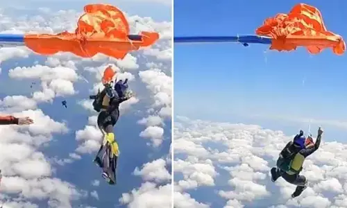 Viral: 15 వేల అడుగుల ఎత్తులో  విమానం వెనుక భాగానికి చిక్కుకున్న స్కైడైవర్ పారాచూట్ (వీడియో)