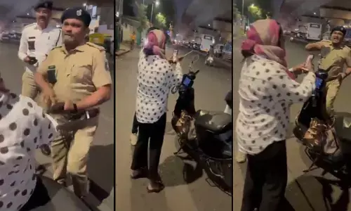 డ్రైవింగ్ లైసెన్స్ చూపించు! అహ్మదాబాద్‌లో మహిళపై పోలీసు అధికారి దాడి.. వీడియో వైరల్