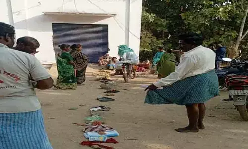యూరియా కోసం చెప్పుల క్యూ..!