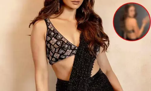బ్లాక్ డ్రెస్సులో వైట్ స్కిన్ కనిపించేలా హీరోయిన్ బోల్డ్ షో.. బ్యాక్ పార్ట్ అంతా అలా వదిలేసిందేంటి..
