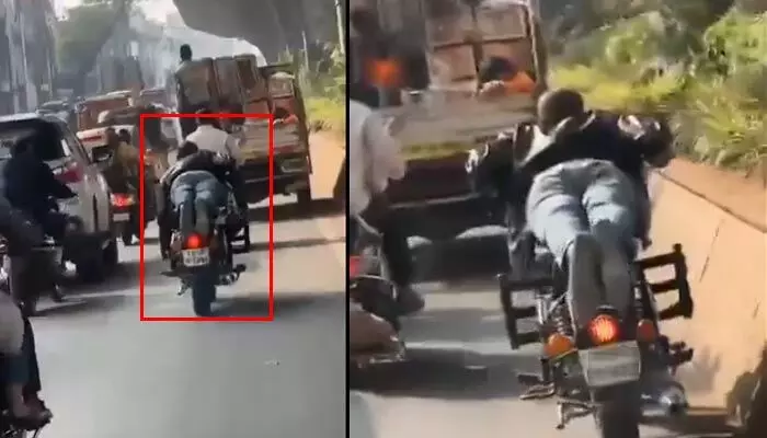 పడుకొని బైక్ నడిపిన పోకిరి.. హైదరాబాద్ ట్రాఫిక్లో డేంజరస్ స్టంట్స్.. వీడియో వైరల్ పడుకొని బైక్ నడిపిన పోకిరి.. హైదరాబాద్ ట్రాఫిక్లో డేంజరస్ స్టంట్స్.. వీడియో వైరల్