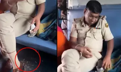 Viral: ఇదేం చెత్త పని సార్? రైలులో పల్లీలు తింటూ అక్కడే పొట్టు పడేసిన పోలీస్ అధికారి!