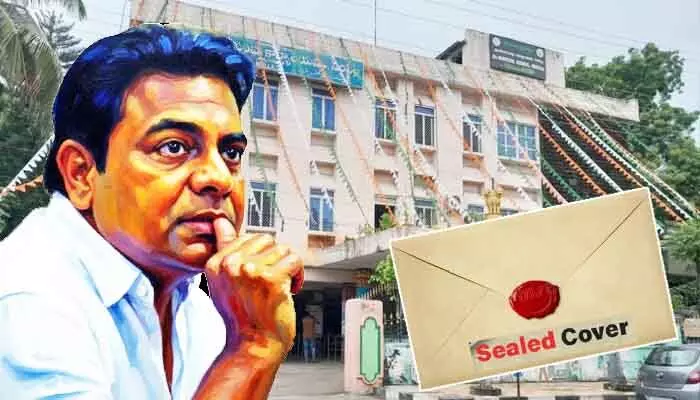 సీల్డ్ కవర్లో మారిన వైస్ చైర్మన్ అభ్యర్థి పేరు.. కేటీఆర్ ఇలాకాలో రచ్చరచ్చ సీల్డ్ కవర్లో మారిన వైస్ చైర్మన్ అభ్యర్థి పేరు.. కేటీఆర్ ఇలాకాలో రచ్చరచ్చ