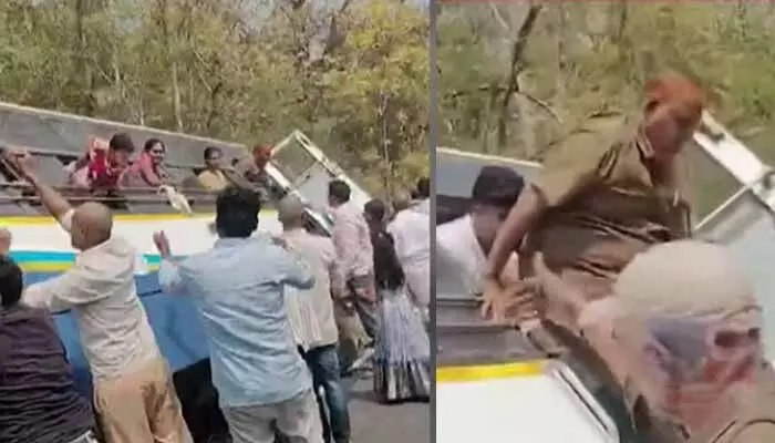 శ్రీశైలం రోడ్డులో ప్రమాదం.. అదుపు తప్పి గుంతలోకి ఒరిగిపోయిన RTC బస్సు శ్రీశైలం రోడ్డులో ప్రమాదం.. అదుపు తప్పి గుంతలోకి ఒరిగిపోయిన RTC బస్సు