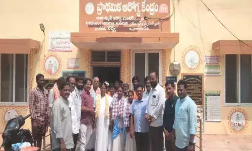 పారిశుద్ధ్య కార్మికులకు పీపీఈ కిట్లు అంద‌జేత