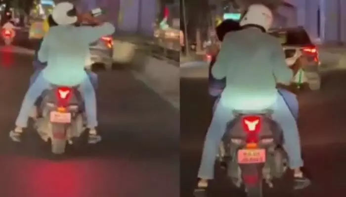 రోడ్డుపై డాక్టర్ల వీరంగం.. బైక్పై ట్రిపుల్ రైడింగ్ చేస్తూ, బీరు తాగుతూ హల్చల్! రోడ్డుపై డాక్టర్ల వీరంగం.. బైక్పై ట్రిపుల్ రైడింగ్ చేస్తూ, బీరు తాగుతూ హల్చల్!